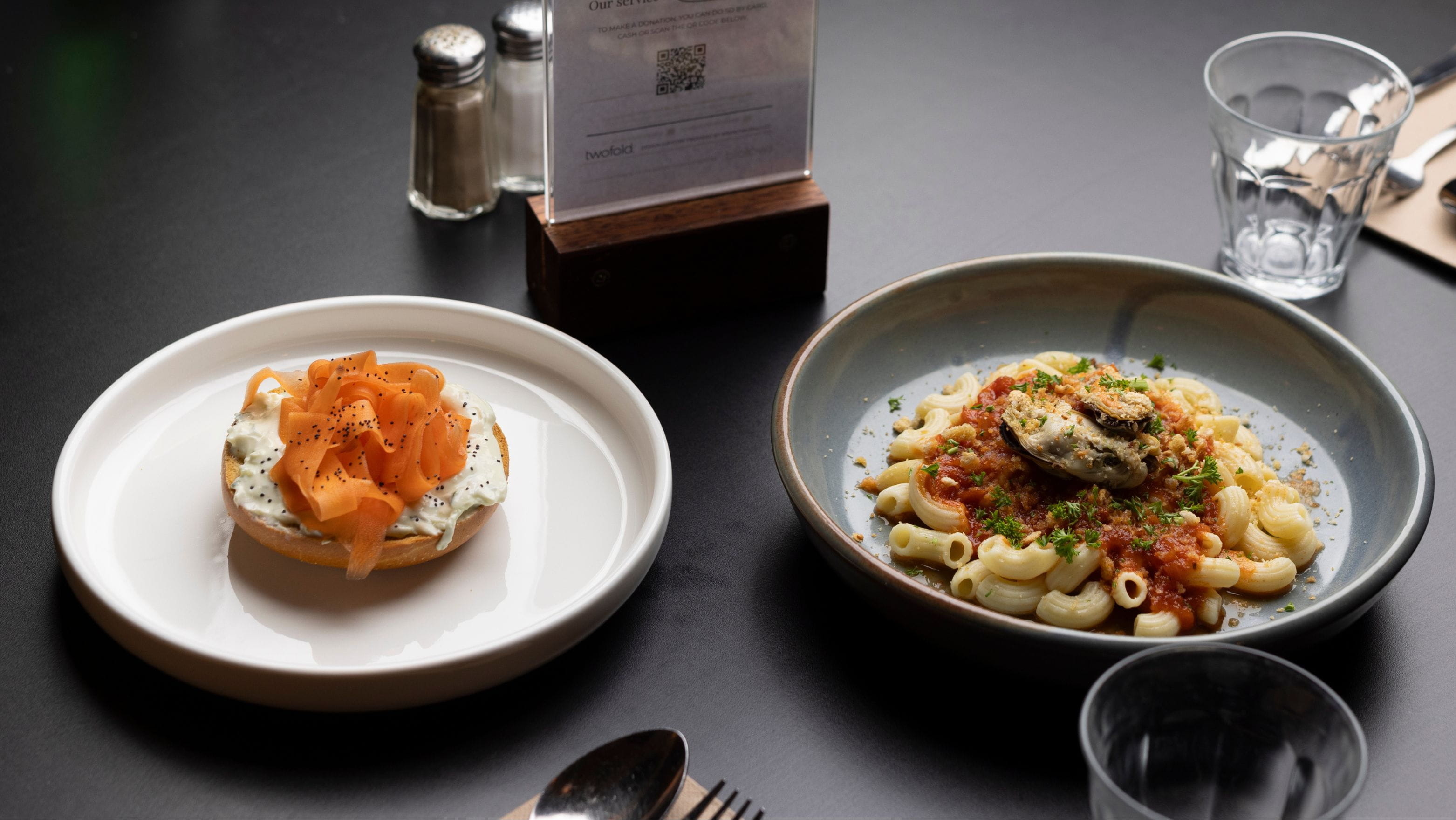 Two gourmet dishes waiting to be eaten.