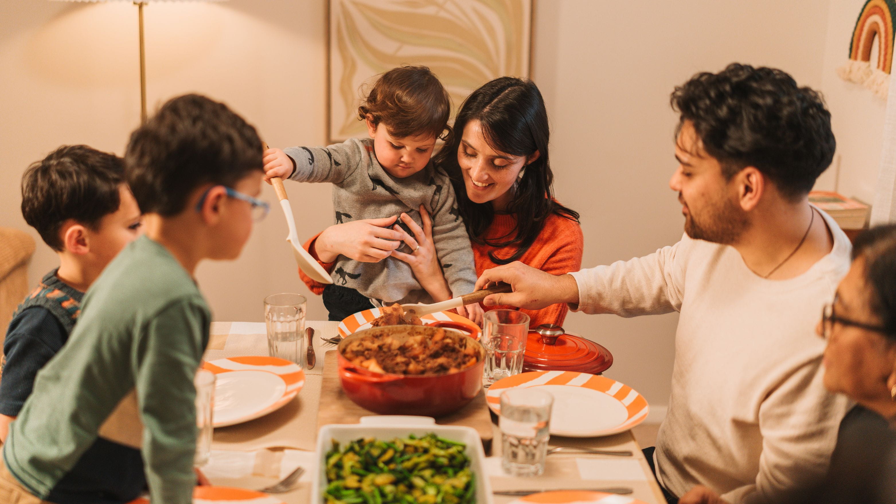 family eating up dinner table
