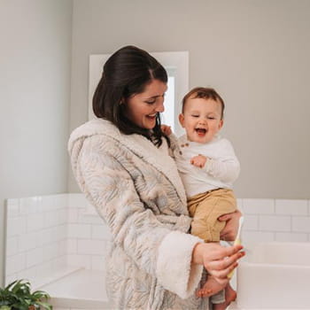 mother holding child