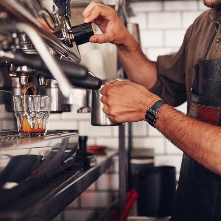 Man using coffee machine